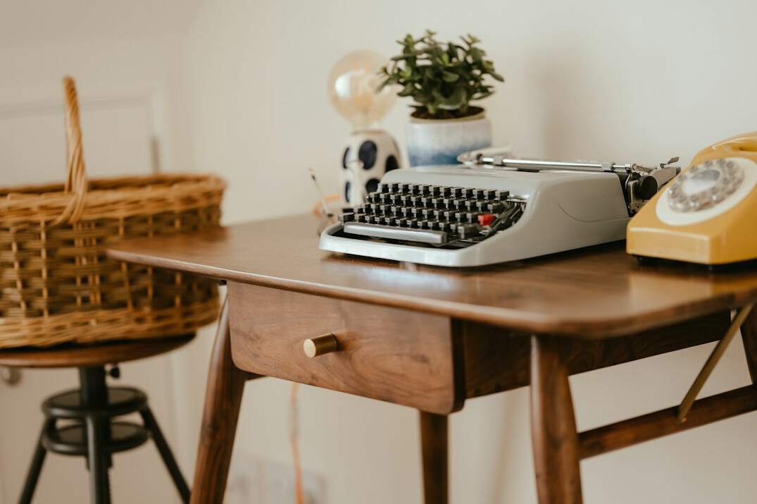 young mystery writer desk